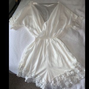 White Summery Romper with Flower Trimmings!
